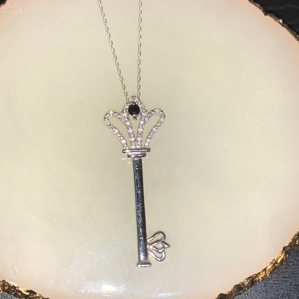 Key necklace with black gemstone